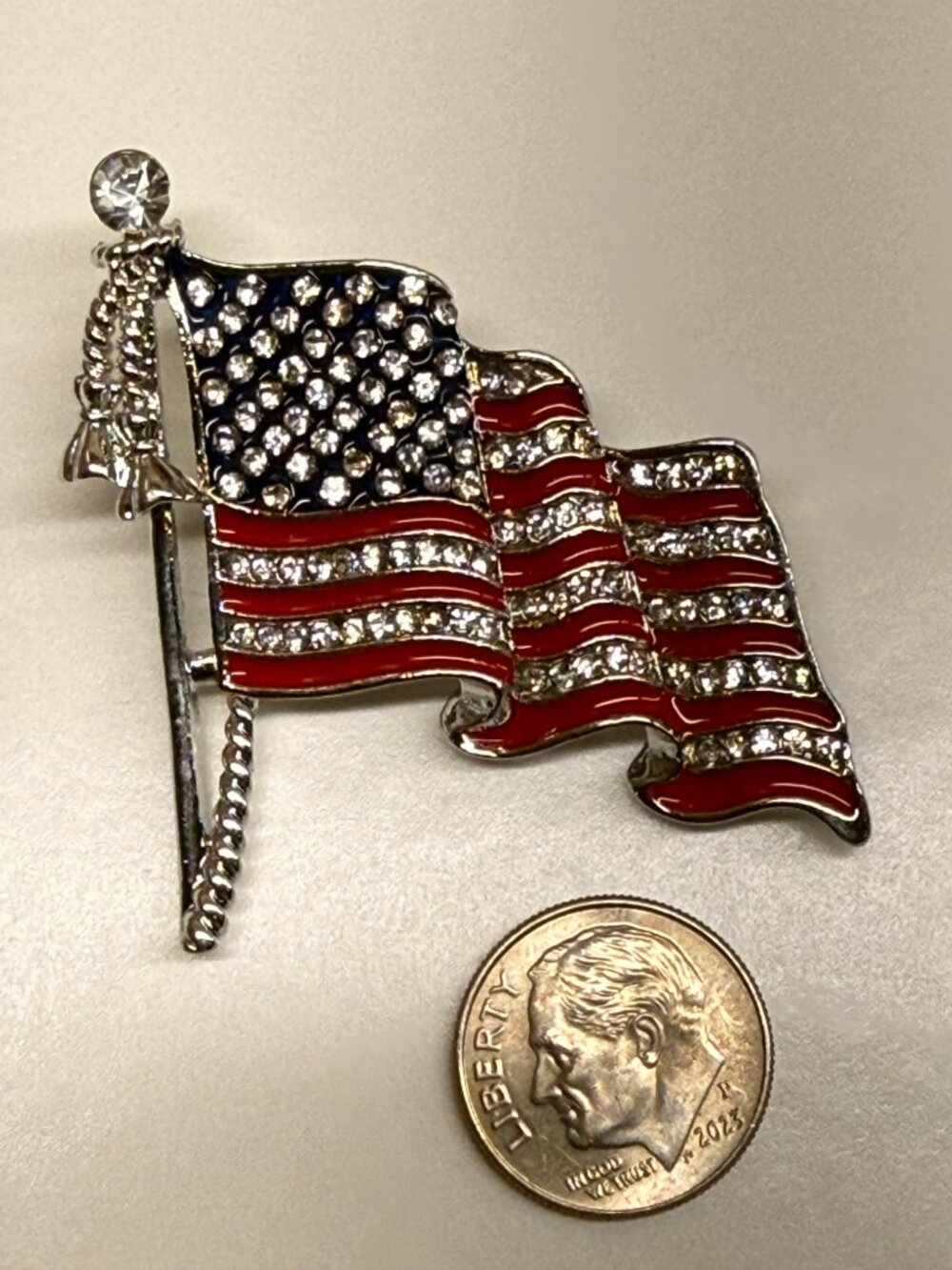 Silver and enamel Rhinestone FlagBrooch Pin measures 2" x 1.5"